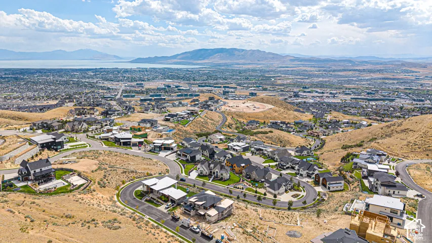 Elevated residential area featuring varied architectural styles and extensive natural surroundings