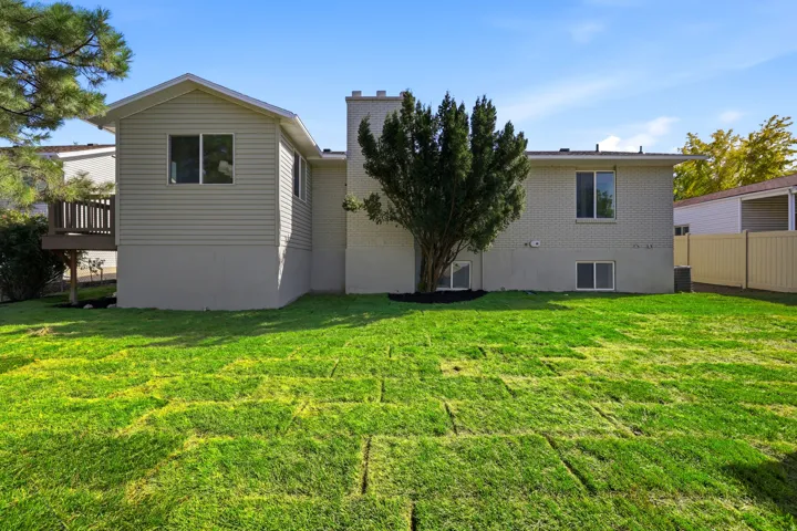 Expansive green lawn with a newly installed sod