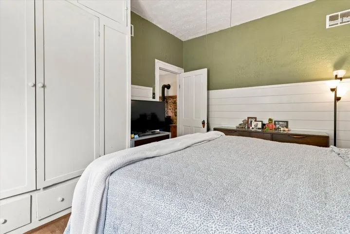 Built-in wardrobe cabinetry with white doors and drawer storage