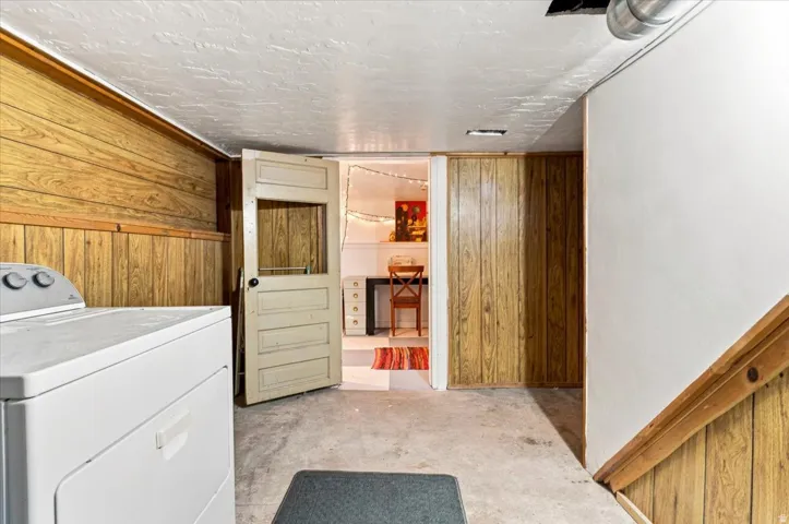 Concrete flooring and wood-finish paneling
