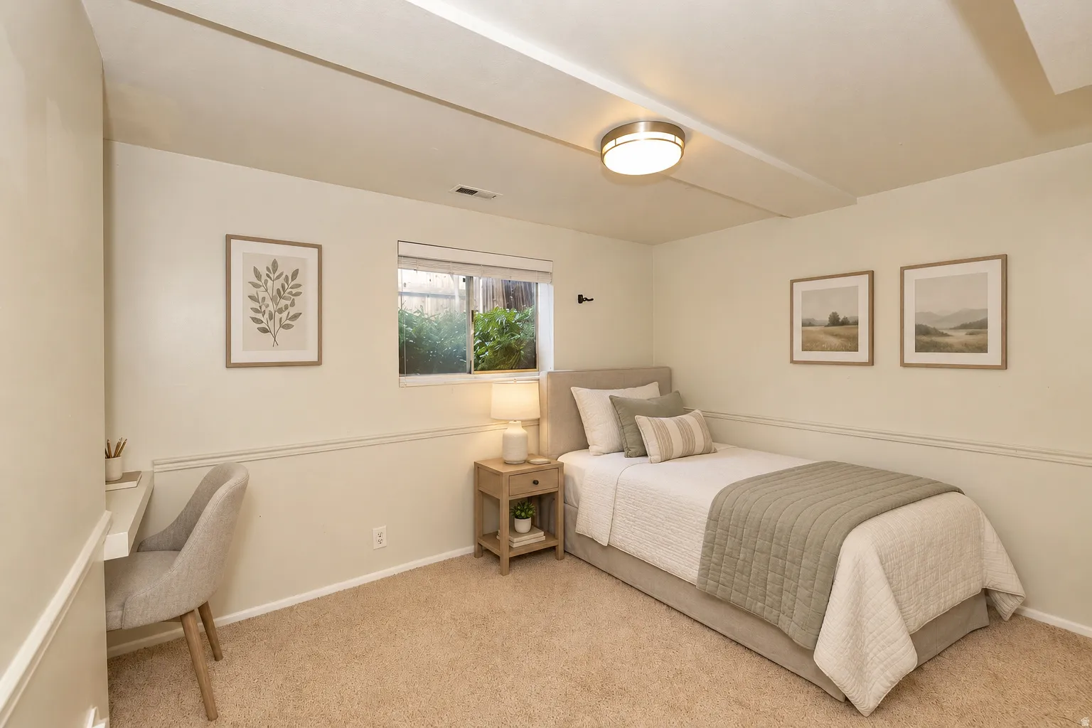 Side A basement bedroom 2 Wall-to-wall carpeting, window with natural illumination, built-in desk, and ceiling-mounted light fixture