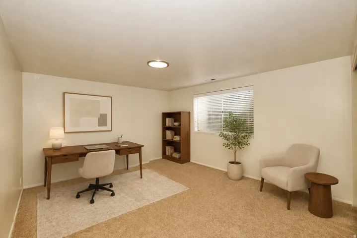 Side A bedroom 2 Neutral wall tones, carpeted flooring, window with blinds, and recessed ceiling lighting