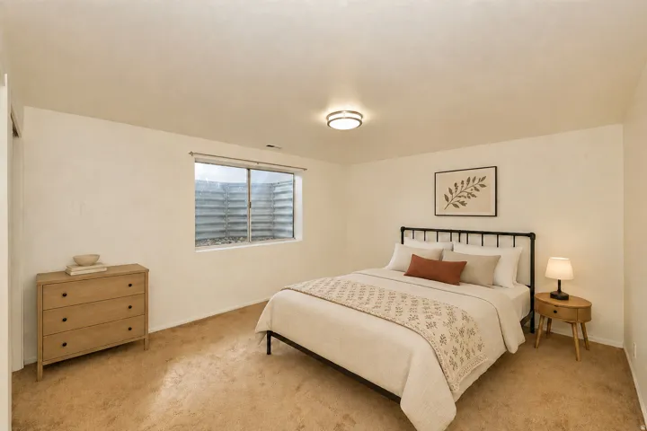 Side B Recessed window well, wall-to-wall carpeting, and flush mount ceiling light