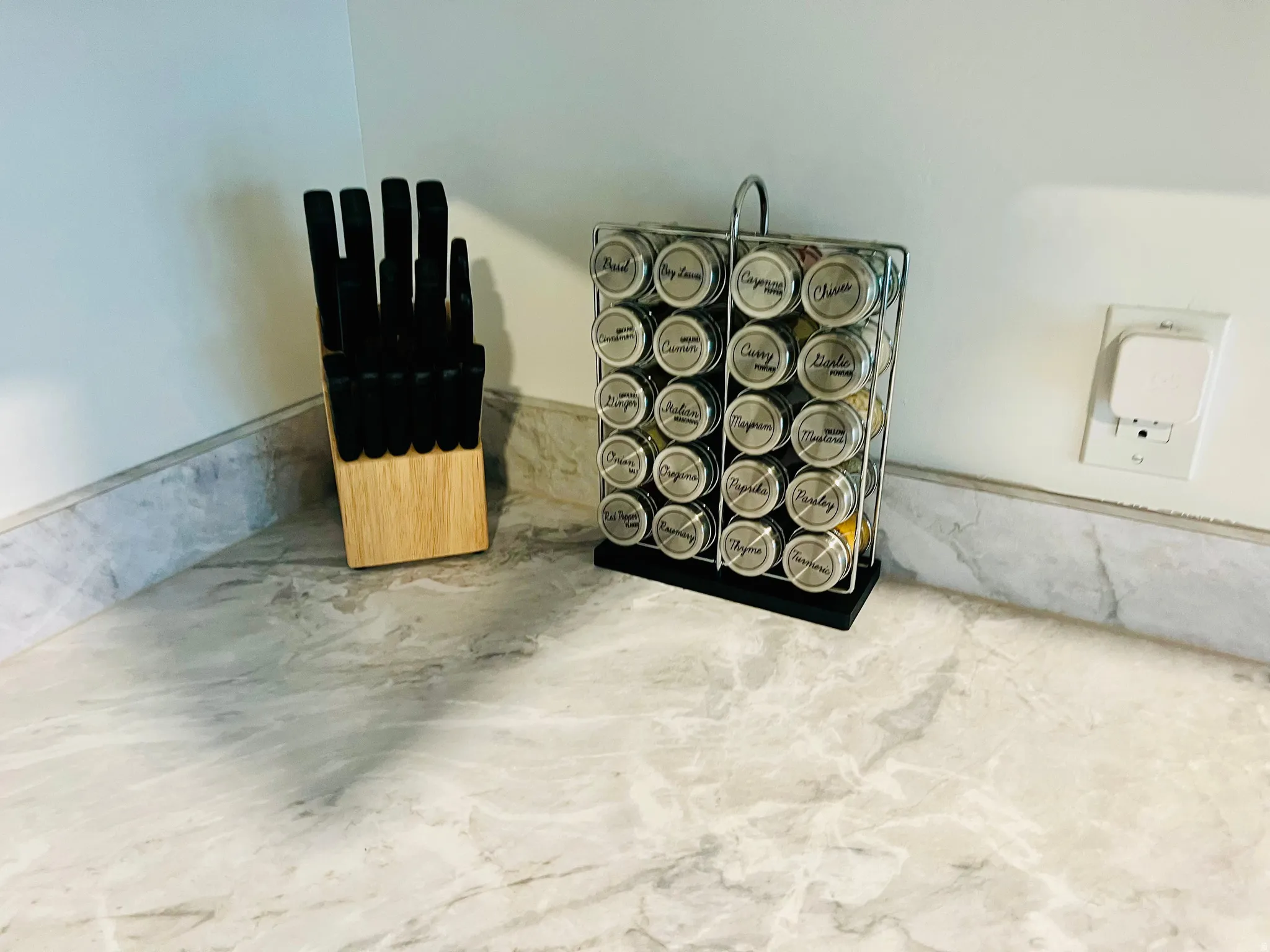 White wall finish with a neutral-toned countertop