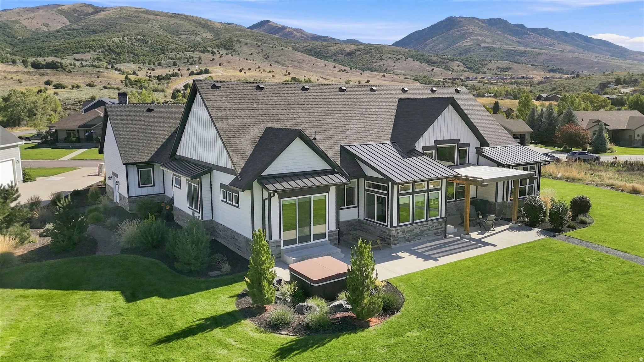 Expansive green lawn with mature landscaping