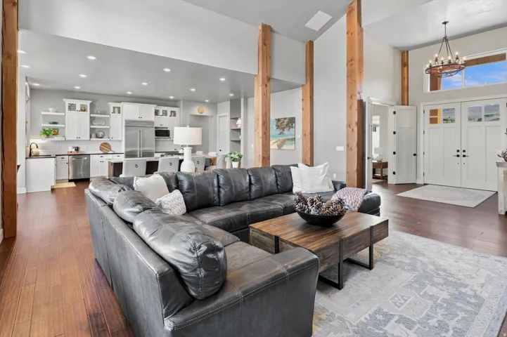Open concept living space with wood-finish flooring