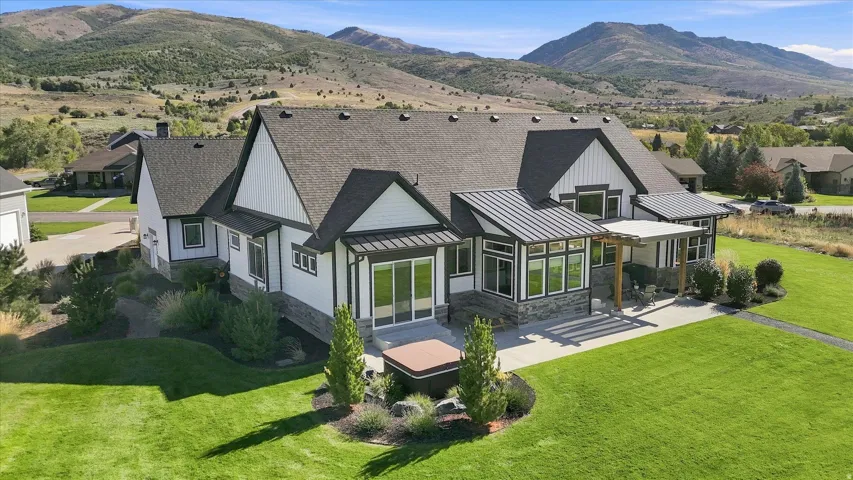 Expansive green lawn with mature landscaping