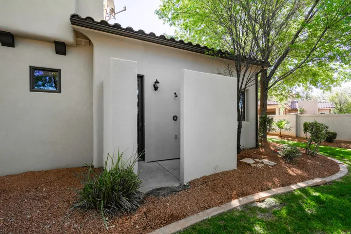 Outdoor shower with privacy wall