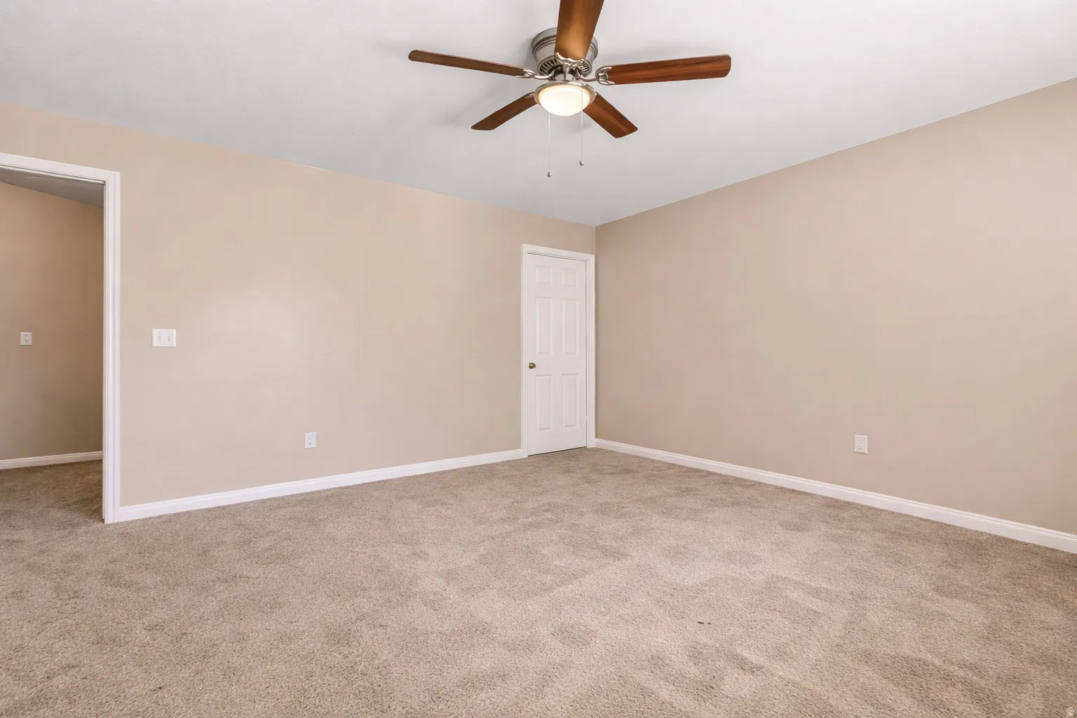 Carpeted flooring, recessed lighting, and a ceiling fan with integrated illumination