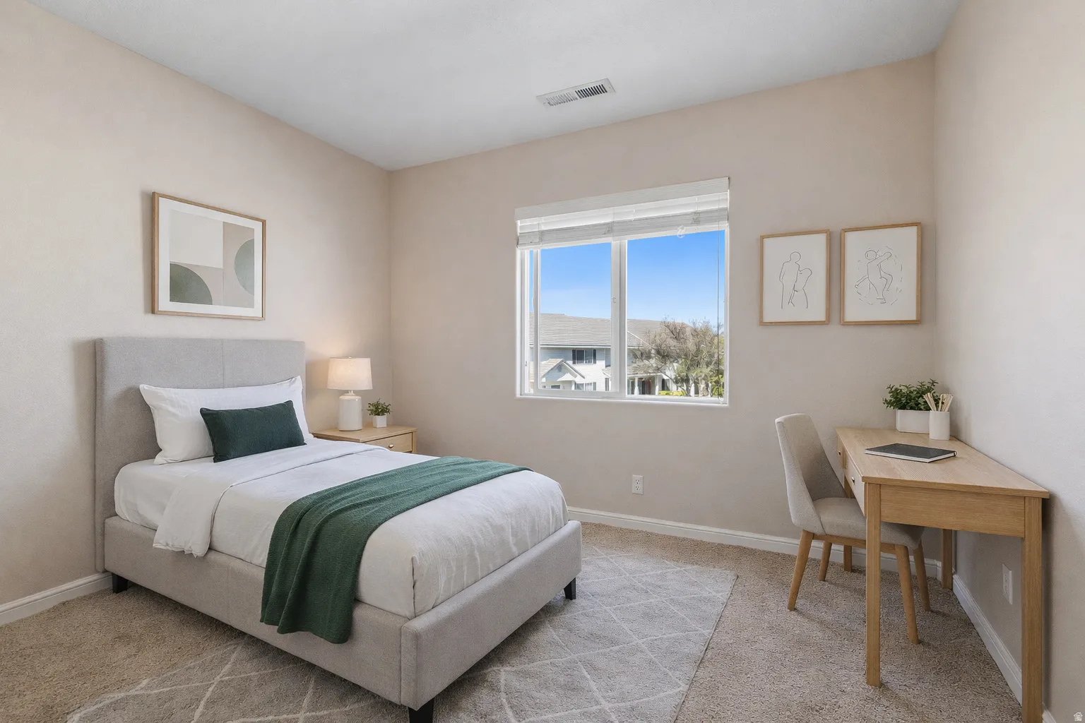 Neutral-toned walls complement the light-colored carpeting