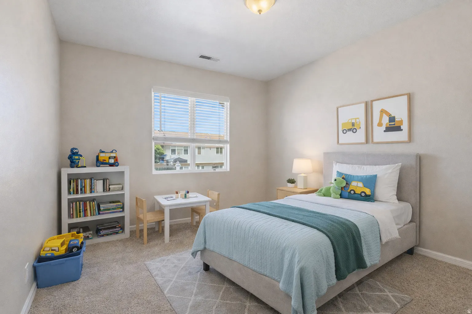 Neutral-toned walls, carpeted flooring, and a large window with blinds