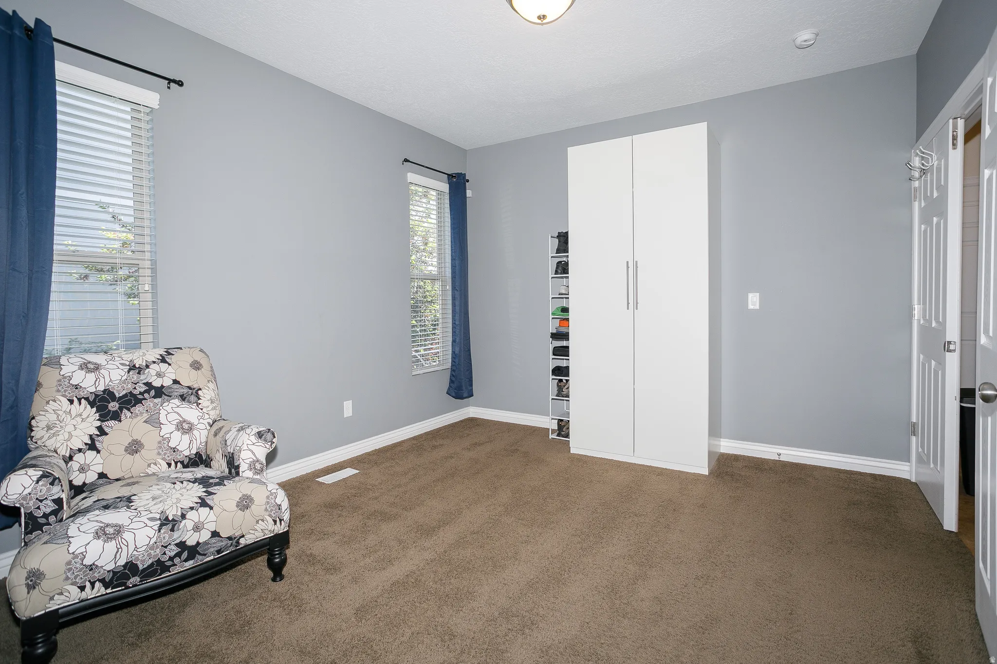 You think this is a bedroom? Nah. This is just the sitting area adjacent to the primary suite!