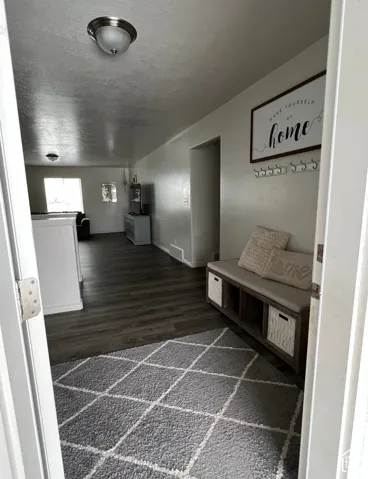 Wood-finish flooring throughout the space