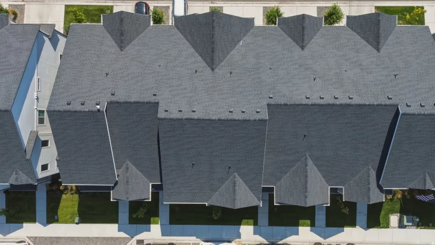Dark-toned asphalt shingle roofing