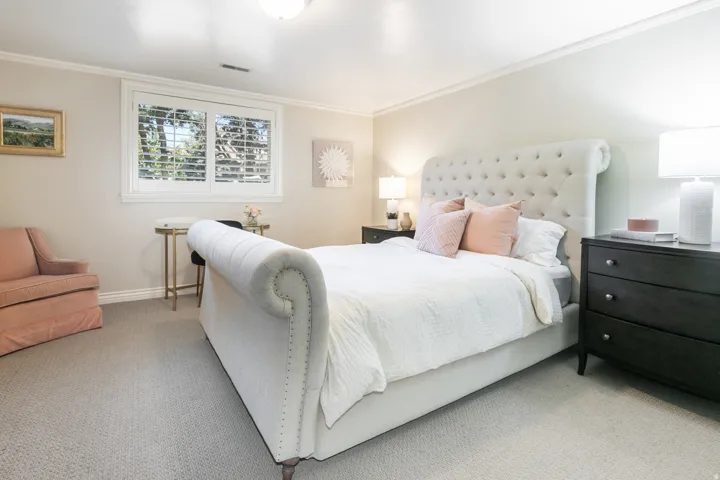 Recessed lighting, crown molding, and carpeted flooring