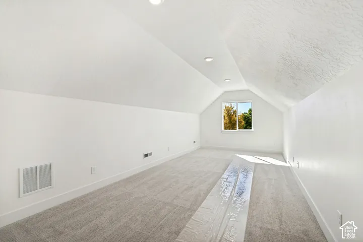 Vaulted ceiling with recessed lighting