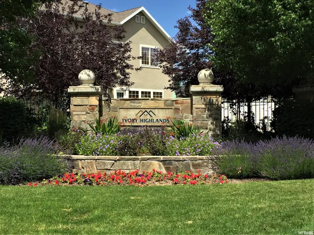 Stone monument signage with landscaped plantings