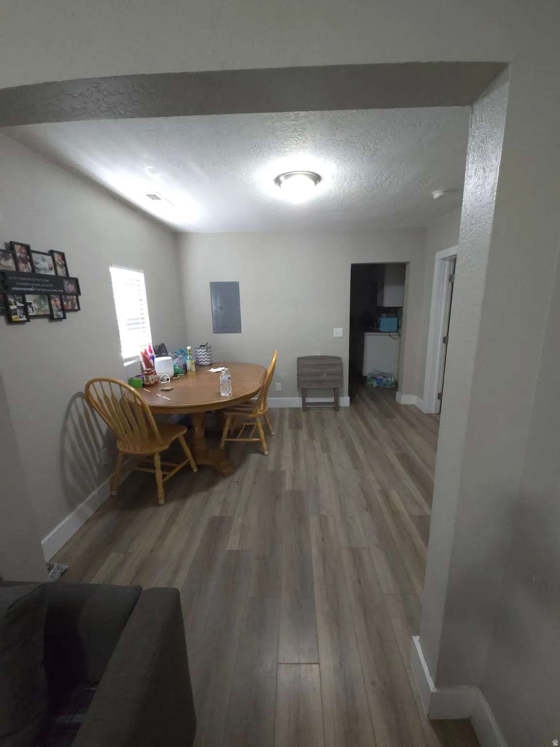 Wood-finish flooring throughout the space