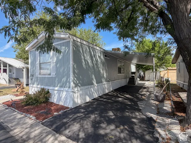 Light blue siding exterior with white trim