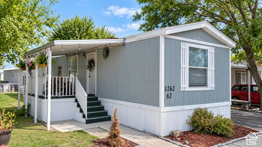 Light blue siding exterior with white trim