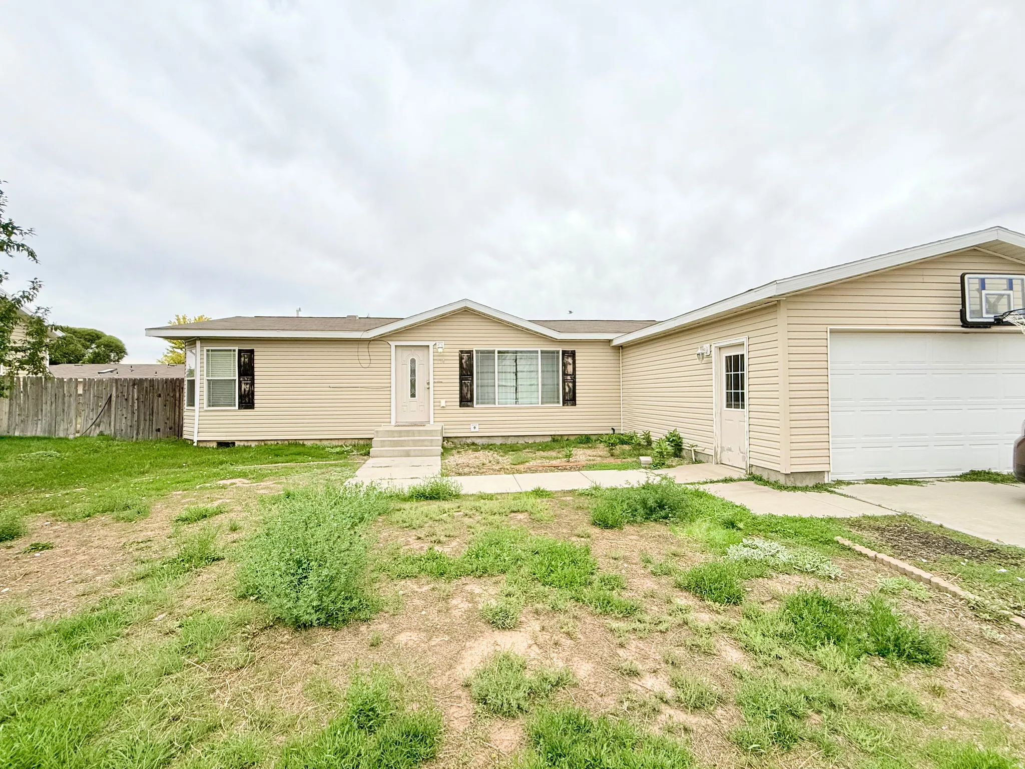 Current photo of home and yard.