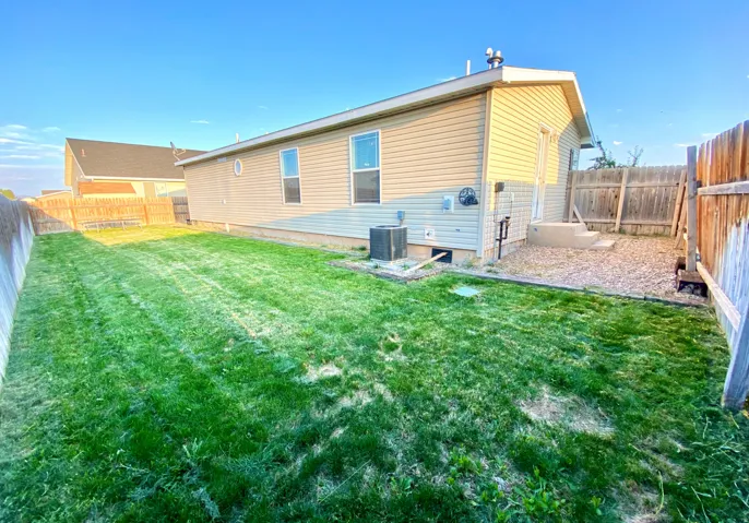 Old photo of back yard to show the potential of what it was and could be.