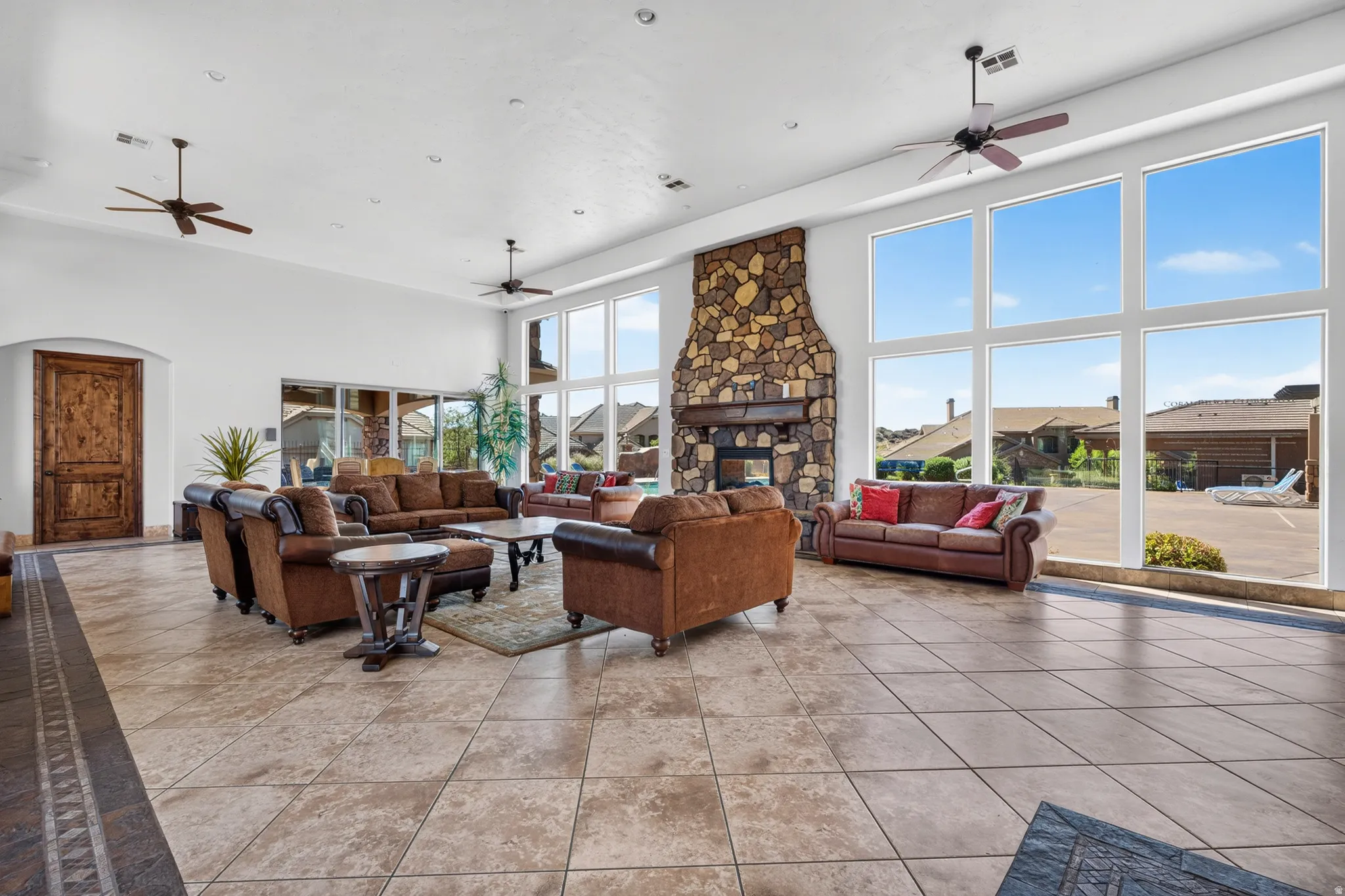 Spacious room for entertaining with large windows letting in ample natural light