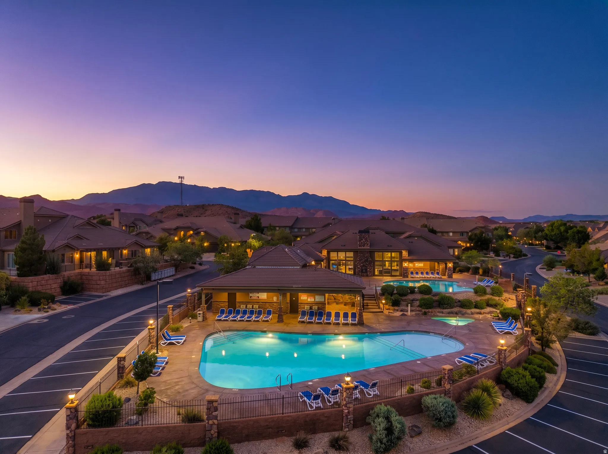 Community amenities featuring multiple swimming pools, spas, and a covered lounge area
