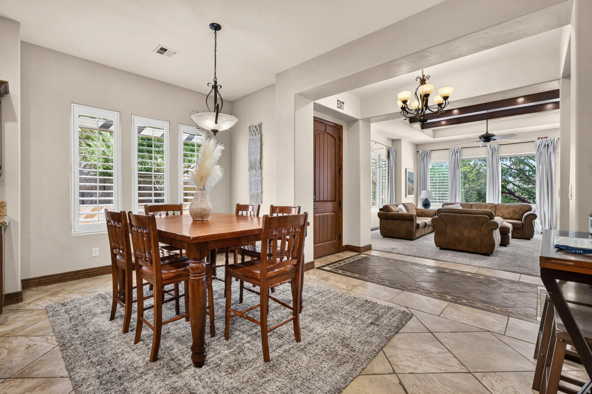 Transitional open-concept living area featuring a large space for dining table