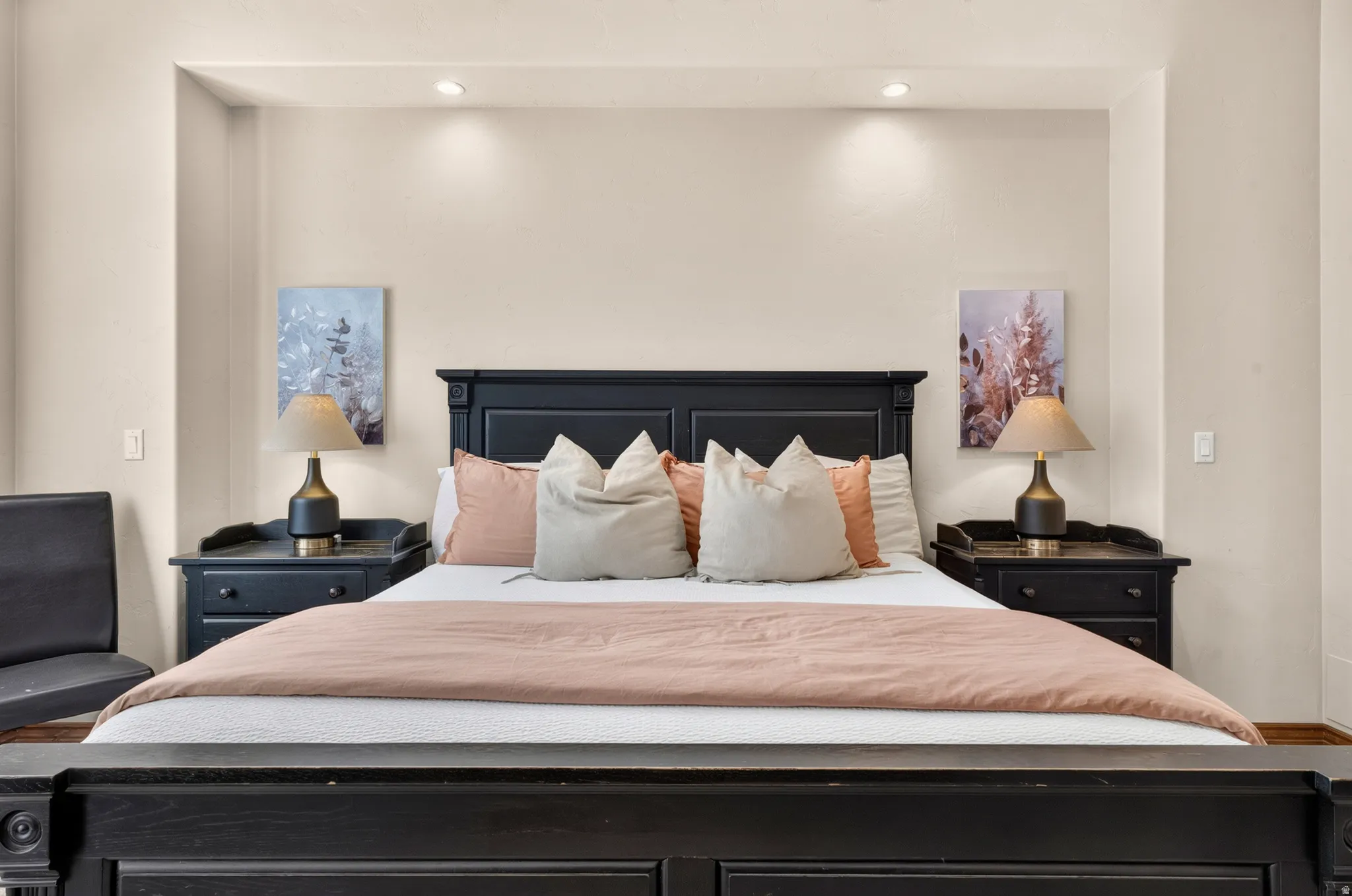 Recessed ceiling lighting illuminates a built-in bed alcove