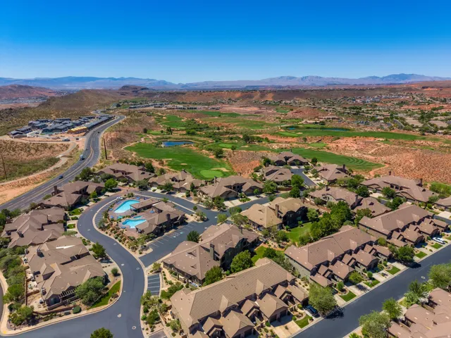 Gorgeous row-end townhome provides additional privacy, community is adjacent to Coral Ridge Golf Course