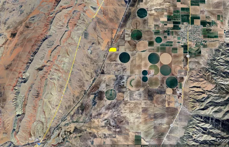 Satellite Imagery. Displaying an aerial overview of the property's geographic context, including surrounding terrain and agricultural patterns