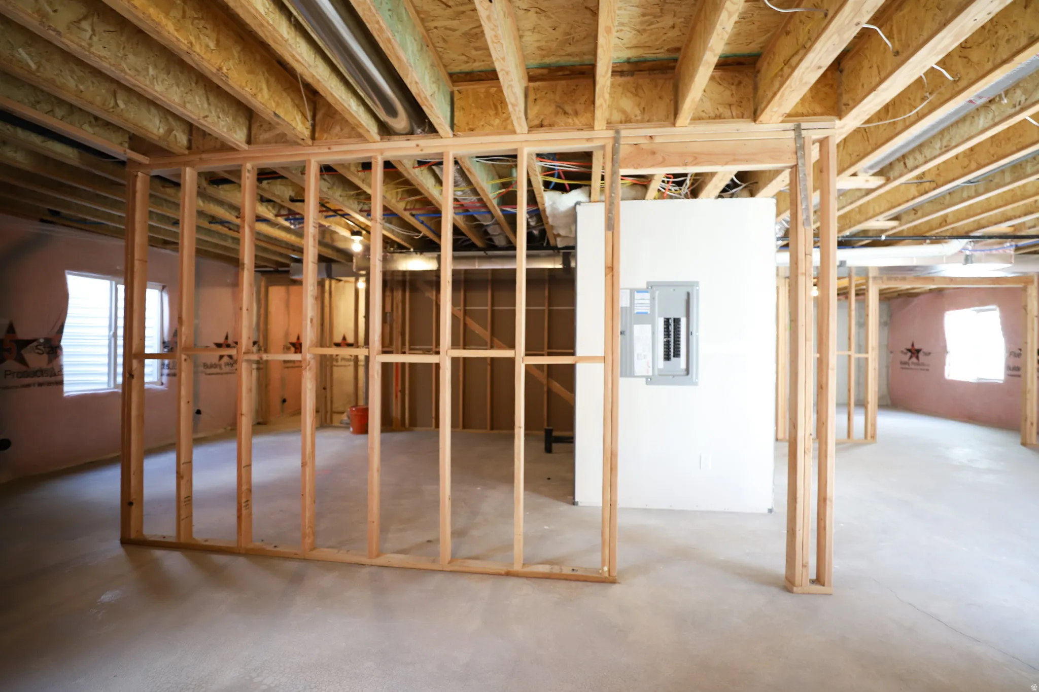 Unfinished basement with potential for large family game room, full bathroom and three bathrooms.