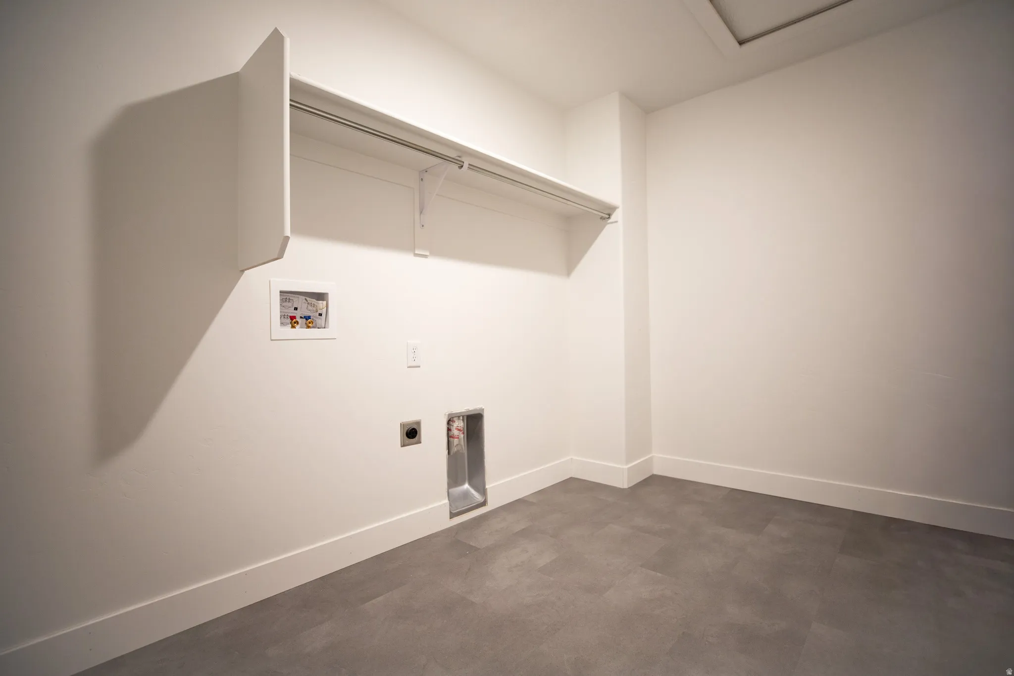 Full-size, dedicated laundry room.