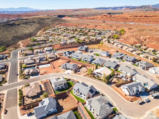 Residential community featuring diverse architectural styles and curved street layouts
