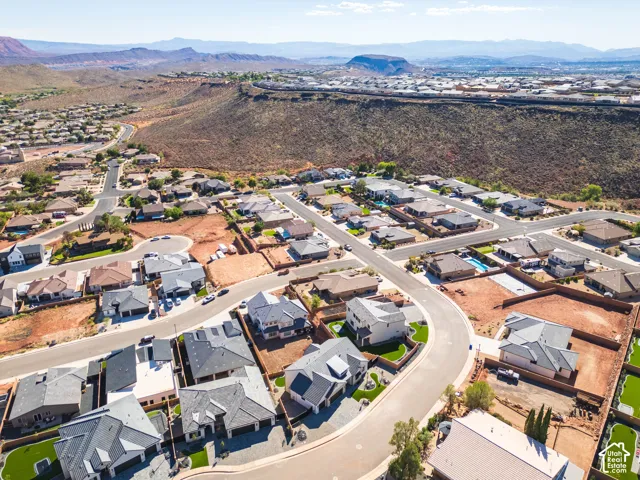 Residential community featuring paved streets and varied home designs