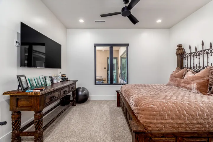 Carpeted flooring, recessed lighting, and a ceiling fan