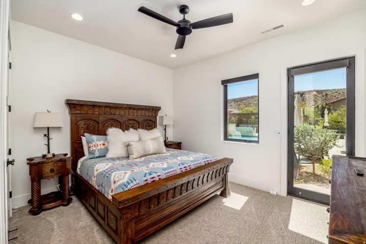 Recessed lighting, ceiling fan, and carpet flooring