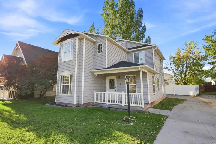 Two-story exterior with light gray siding