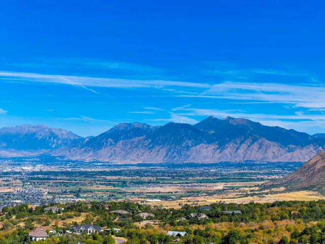 Mountain backdrop with a distant valley and residential areas
