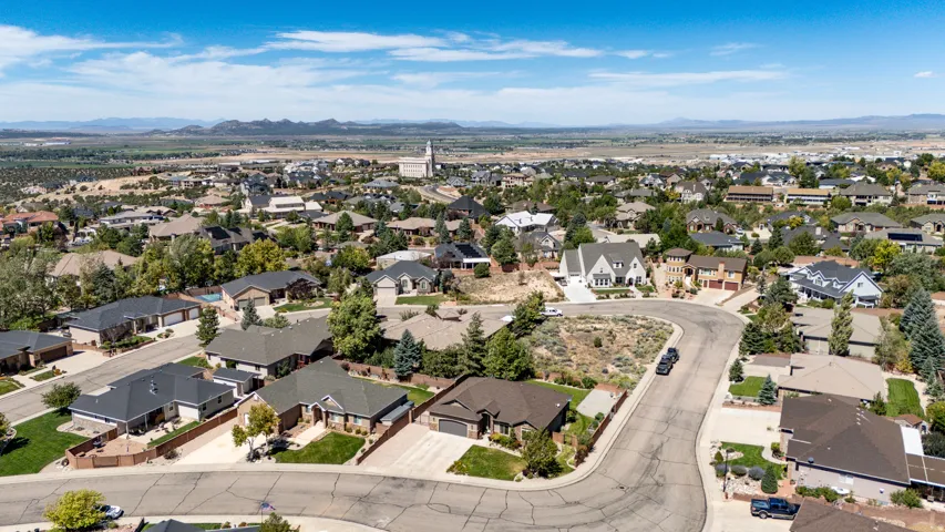 Residential neighborhood with varied architectural styles and mature landscaping