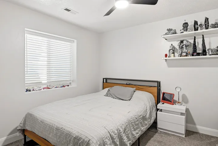 Recessed window with white blinds