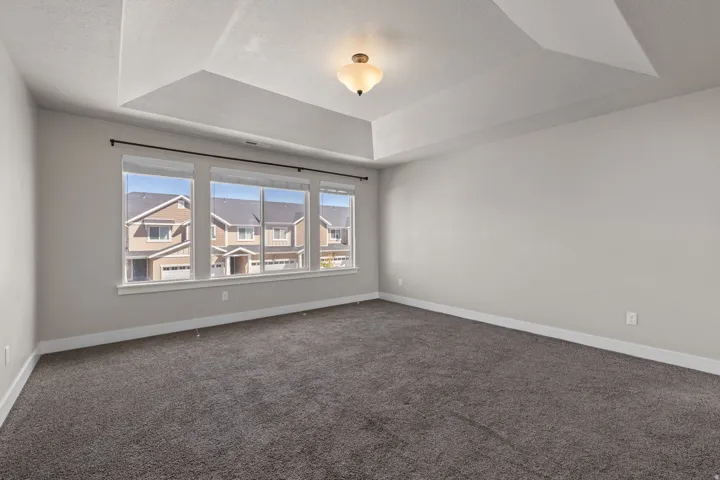 Tray ceiling with a central flush mount light fixture