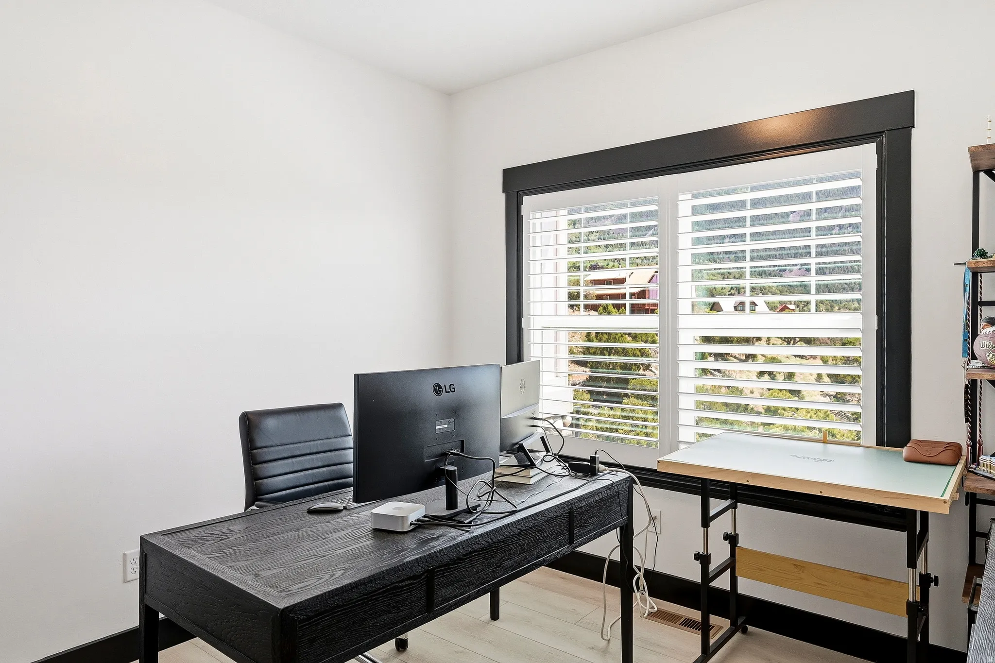 White walls with wood-finish flooring