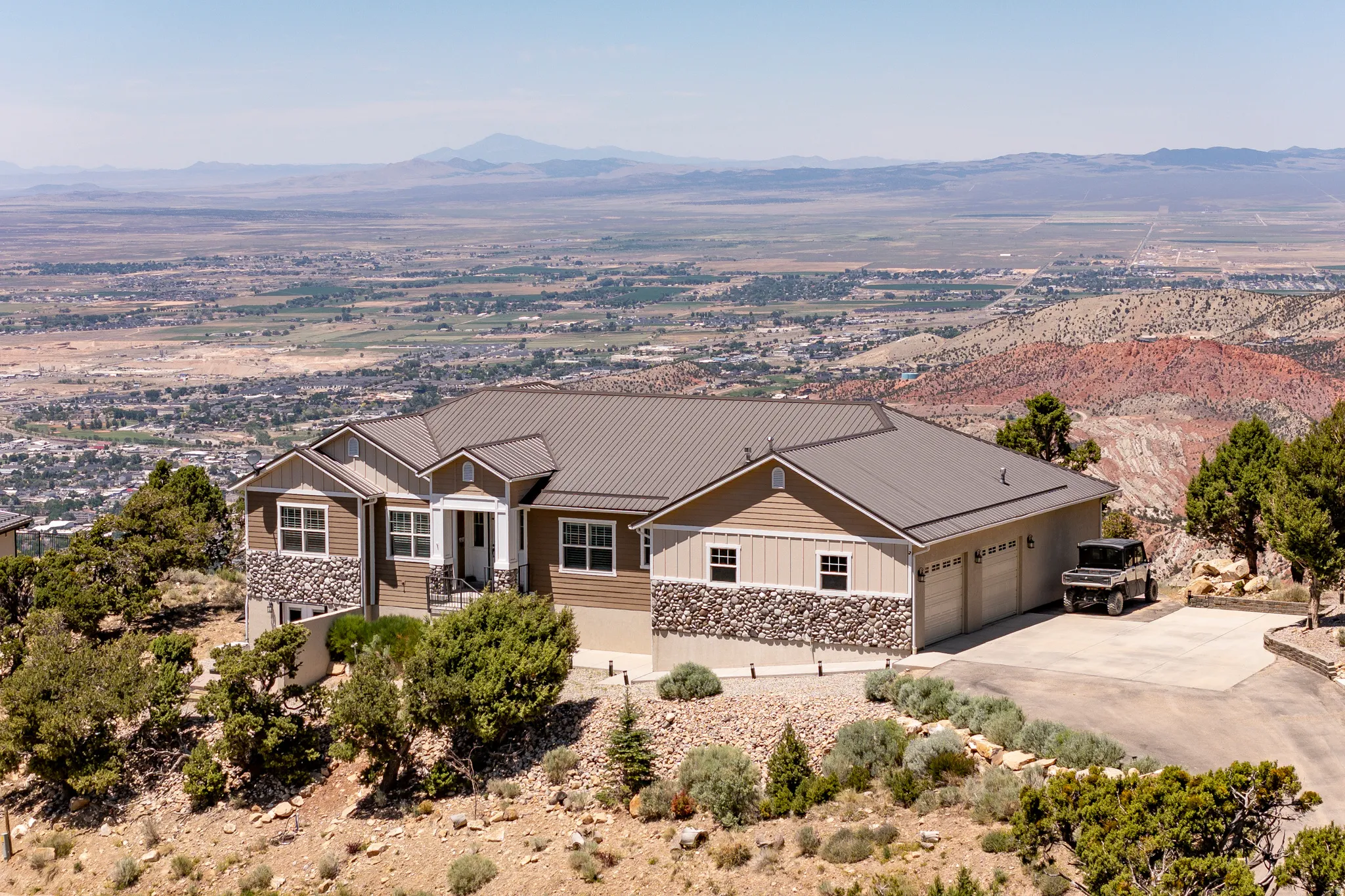 Contemporary residence with a metal roof and multi-pane windows