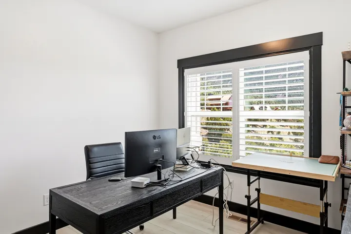 White walls with wood-finish flooring