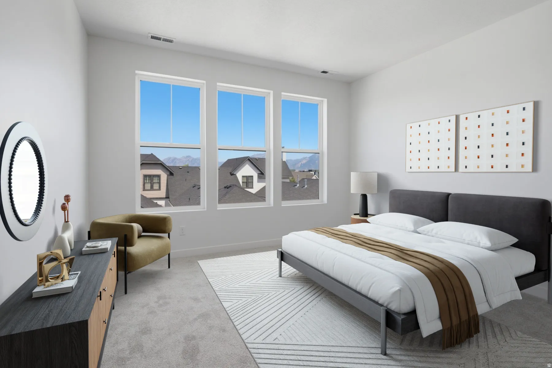 Three large windows, plush carpeting, high ceilings, and a built-in light fixture