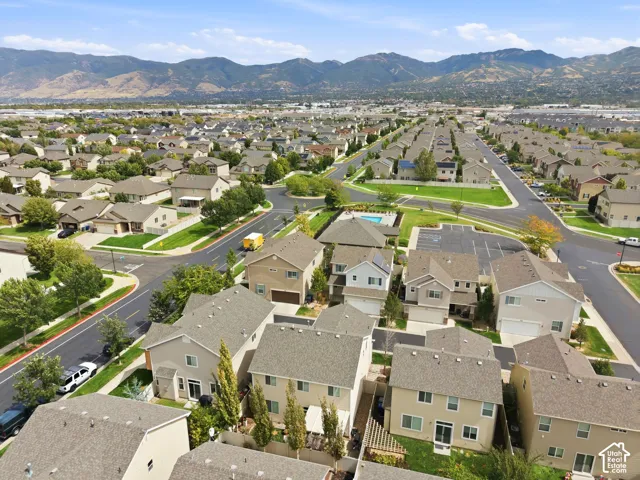 Residential neighborhood featuring paved streets and manicured landscaping