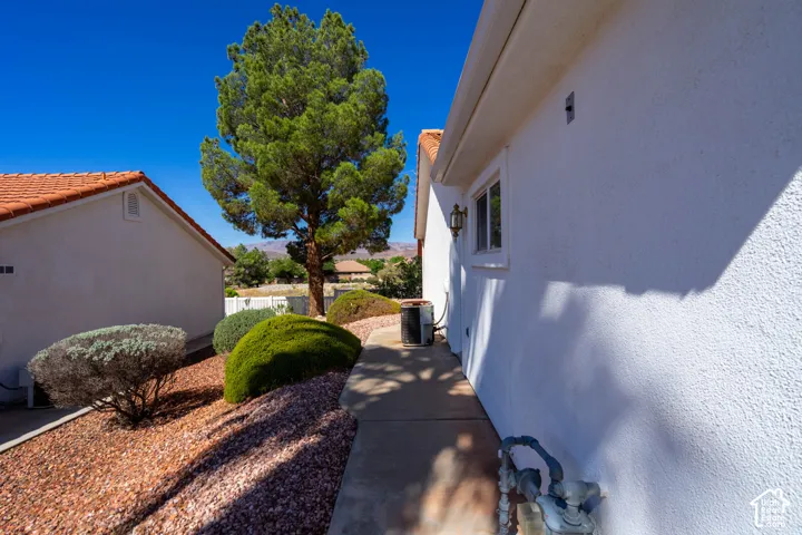 Stucco exterior with a terracotta tile roof