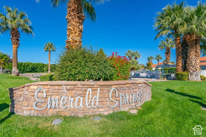 Stone-clad entry monument with dimensional lettering